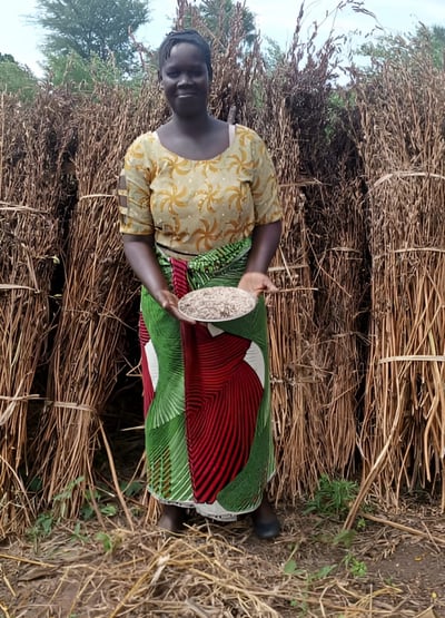 Nelly standing in front of her harvest 
